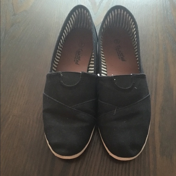 Black canvas slip on's!! Looks like TOMS