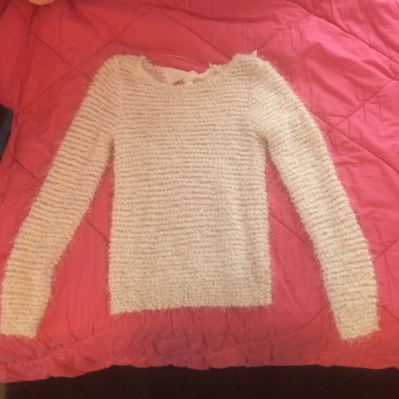 White Jennifer Lopez shimmery sweater