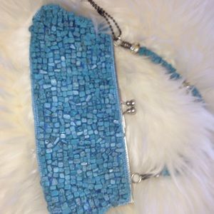 Solid stone turquoise bag. New with tags.