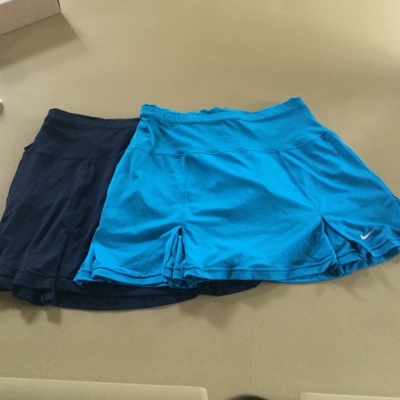 THREE nike tennis skirts.
