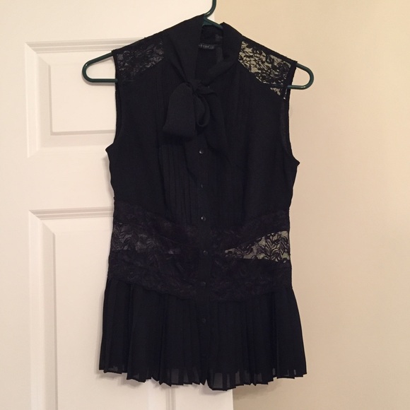 Black, peplum blouse, never worn!