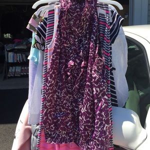 Short sleeve button down blouse.