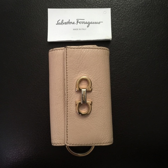Authentic & pre-loved Ferragamo pink key wallet.