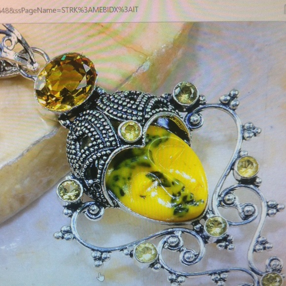 Jewelry - Beautiful carved face Quartz and jasper stones