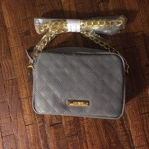 IMAN cross body purse