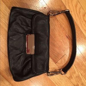 Black leather clutch with chrome hard wear.