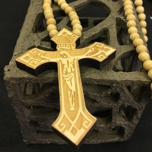 Wooden carved cross with beaded necklace