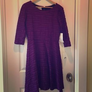 Flattering, long sleeved high waisted dress