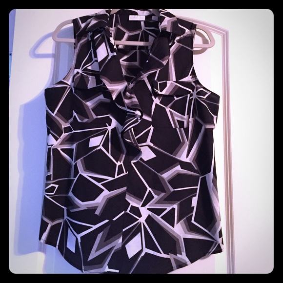 Sleeveless ruffle front blouse