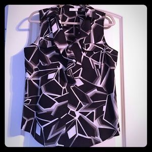 Sleeveless ruffle front blouse