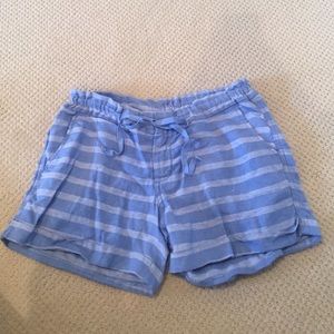 blue stripped shorts.