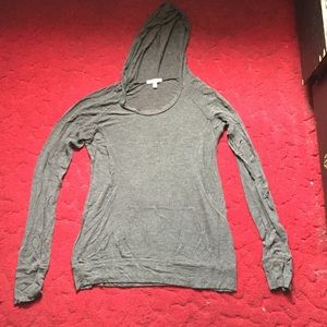 Grey shirt with hood & pocket.
