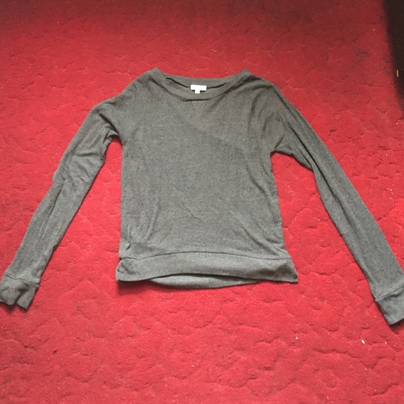 Gray long sleeved shirt.