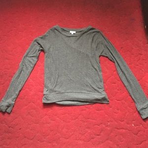 Gray long sleeved shirt.