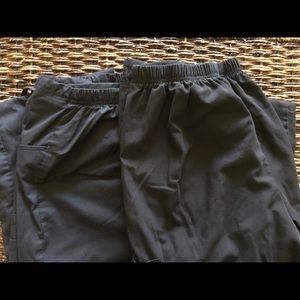Two black scrub pants