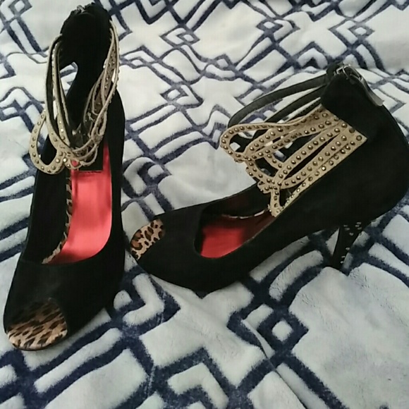 Black and gold high heels