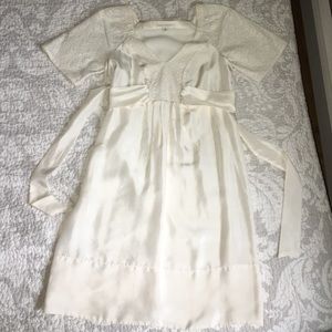 Off white easy fit below knee dress with ribbon