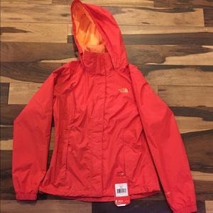 north face raspberry and orange rain coat