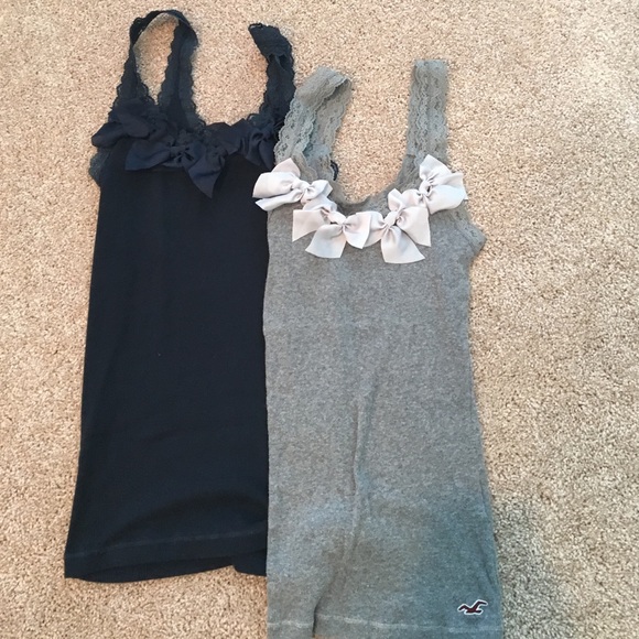 One gray one navy blue Hollister tanks