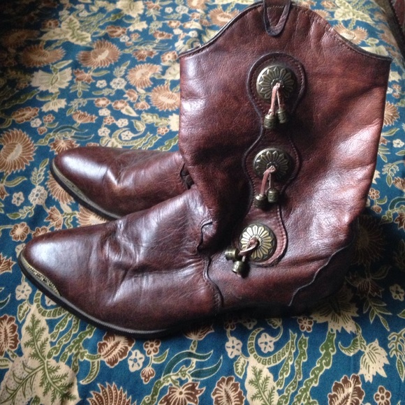 Vintage leather cowgirl boots with brass tassels
