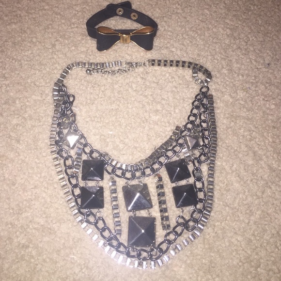 costume necklace and gold and black bracelet