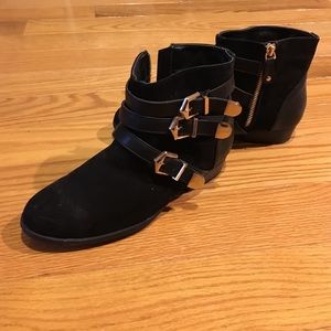 Black booties with gold detail