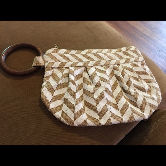 Mudpie hand bag with wooden bracelet.