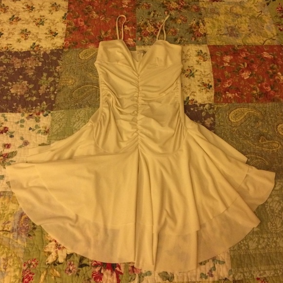 Ruffled skirt dress in cream