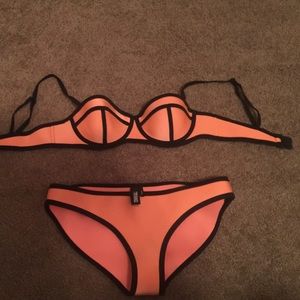 Authentic triangl swimsuit.