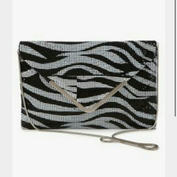 Bebe silver sequence zebra print clutch