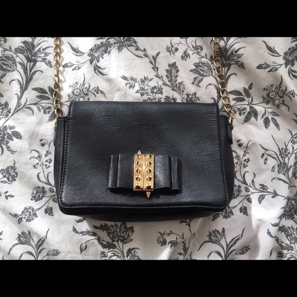 Edgy cross body purse