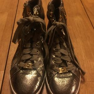 Metallic gold Michael Kors sneakers
