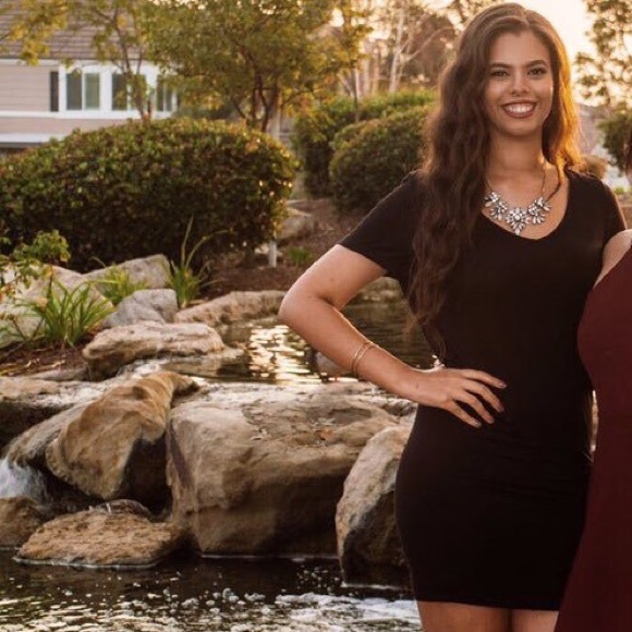 Black jersey dress with open/cross back