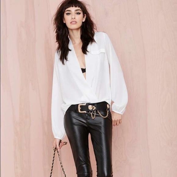 white plunge neck top