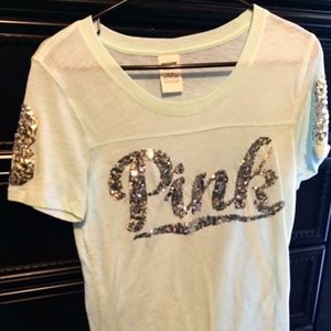 Pink T shirt   (willing to trade for another Vs)