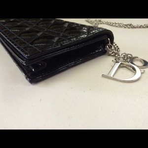 Lady Dior patent leather clutch bag