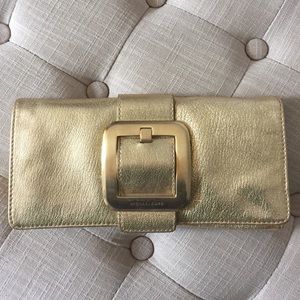 Michael Kors Gold buckled clutch Shopbop