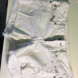 White frayed jean shorts. Size 0 but fit a size 2