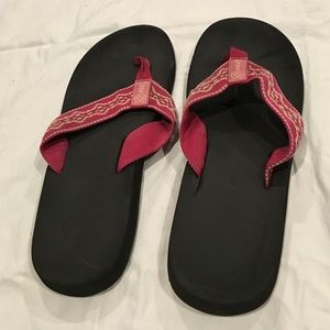 Pink reef flip flops