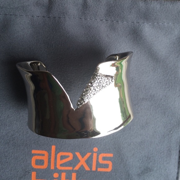 Alexis Bittar silver torn cuff with crystals.