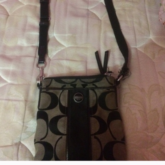 Ok Condition Coach Purse , Black .