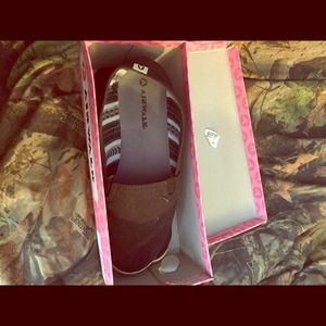 Black slip on air walk shoes. Size 9