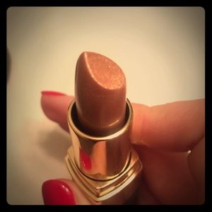 Bobbi brown beige gold shimmer lipstick.