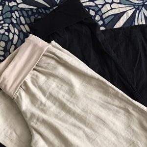 Two pair of linen-blend pants in beige and black