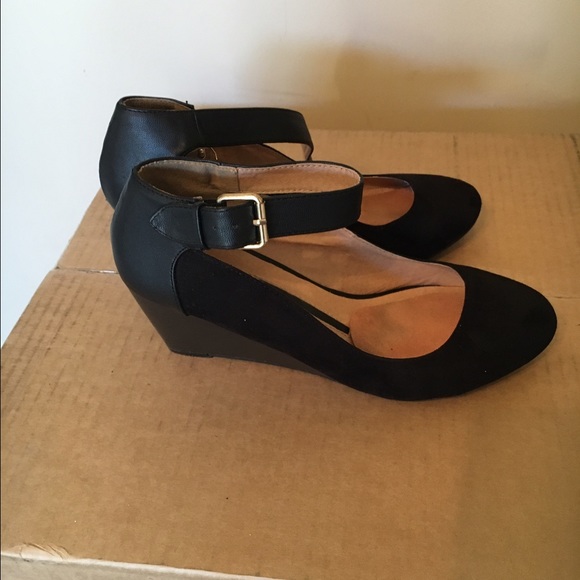 Black suede and leather shoes.