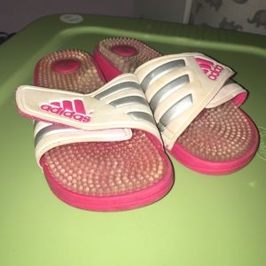 Pink and white adidas slides