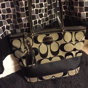 Black and gray Coach purse