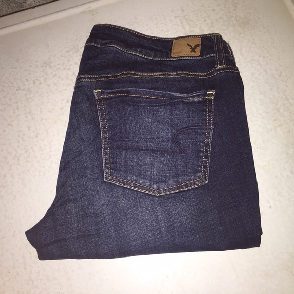 Distressed dark wash jegging