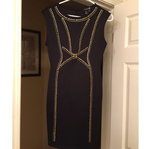 Gold studded little black dress
