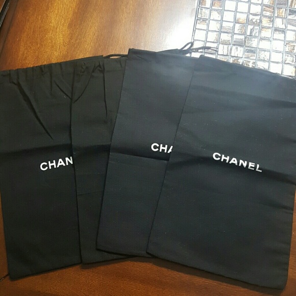 Chanel 4 shoes dust bags.